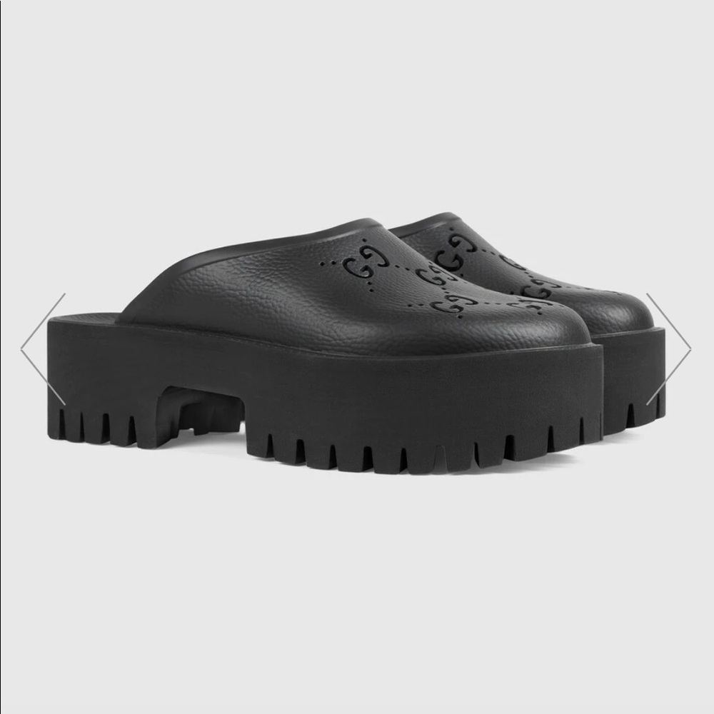 Authentic Gucci elea perforated rubber platform mules. Size 37